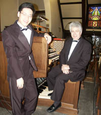 John Hyunil Hong, left, congratulates David Close on his entertaining performance and commentary.